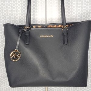 Michael Kors Jet Set Black Tote with Leopard pattern inside
